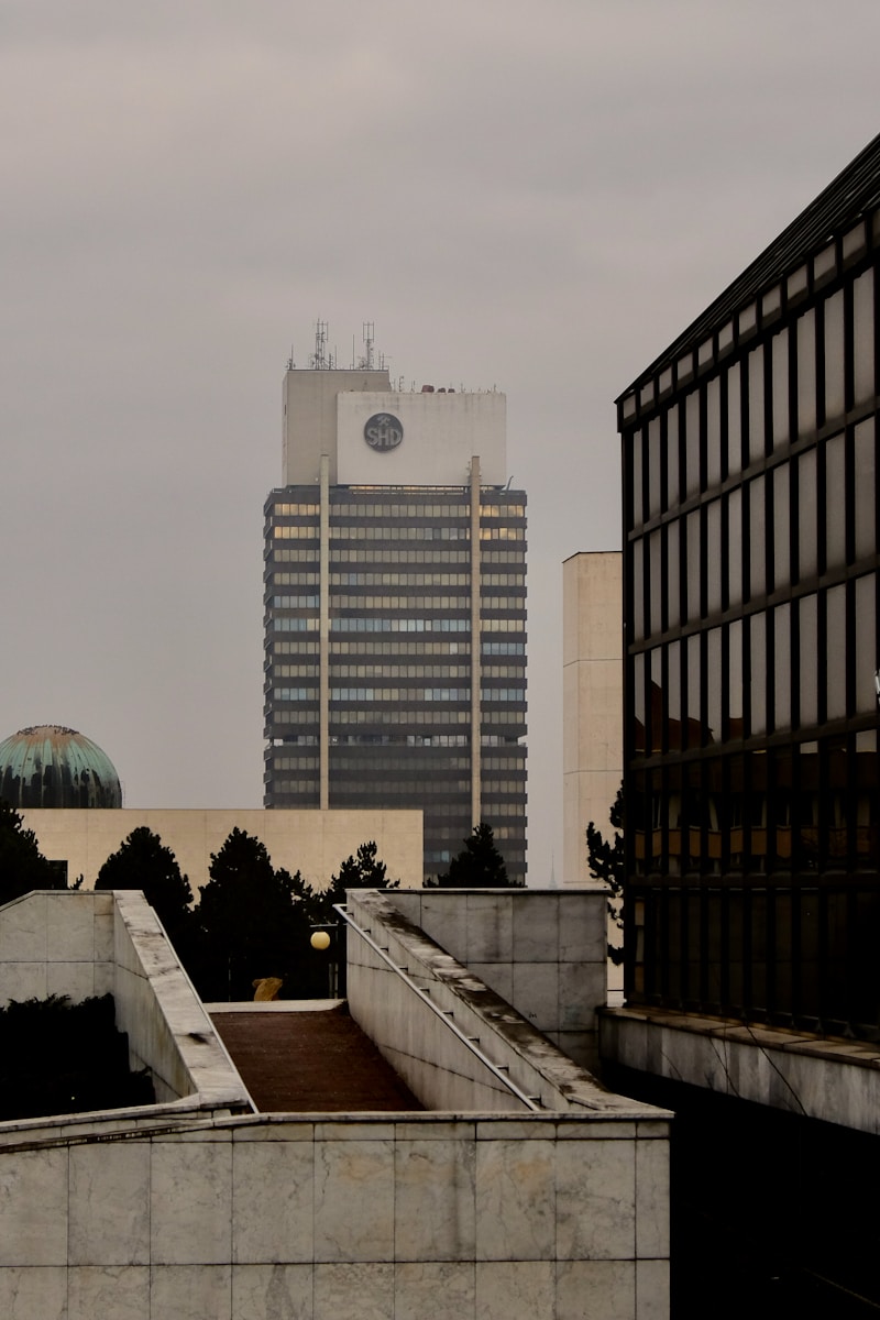 a tall building with a clock on the top of it